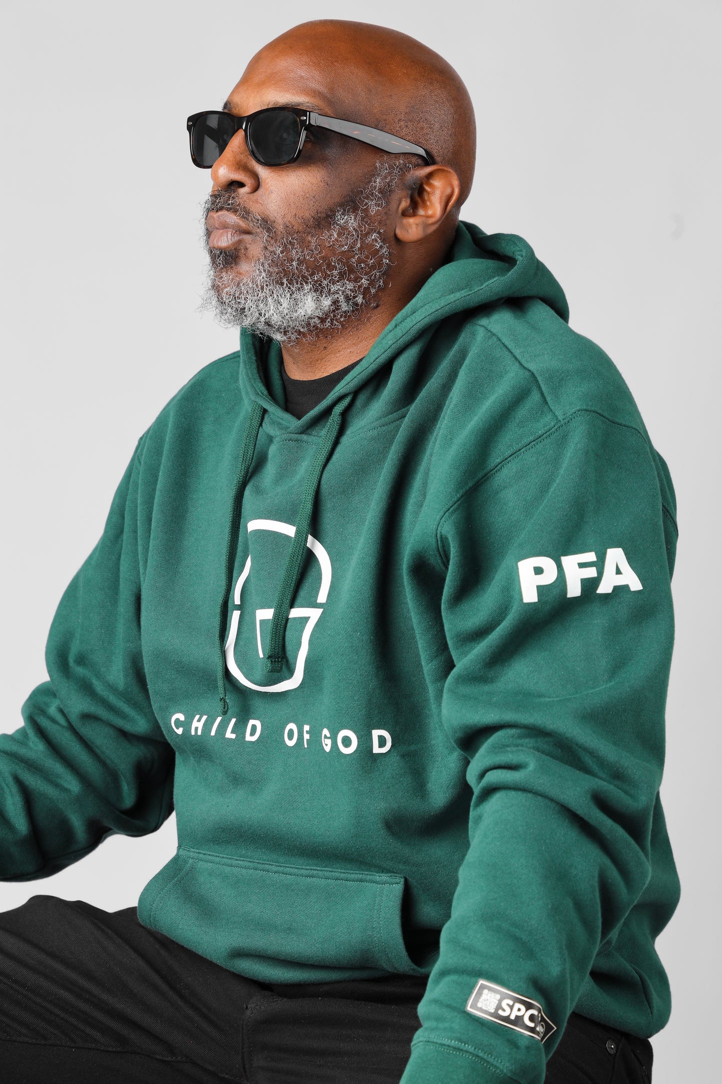 SPECIAL EDITION GREEN COG "WE RAISED EACH OTHER" PFA HOODIE